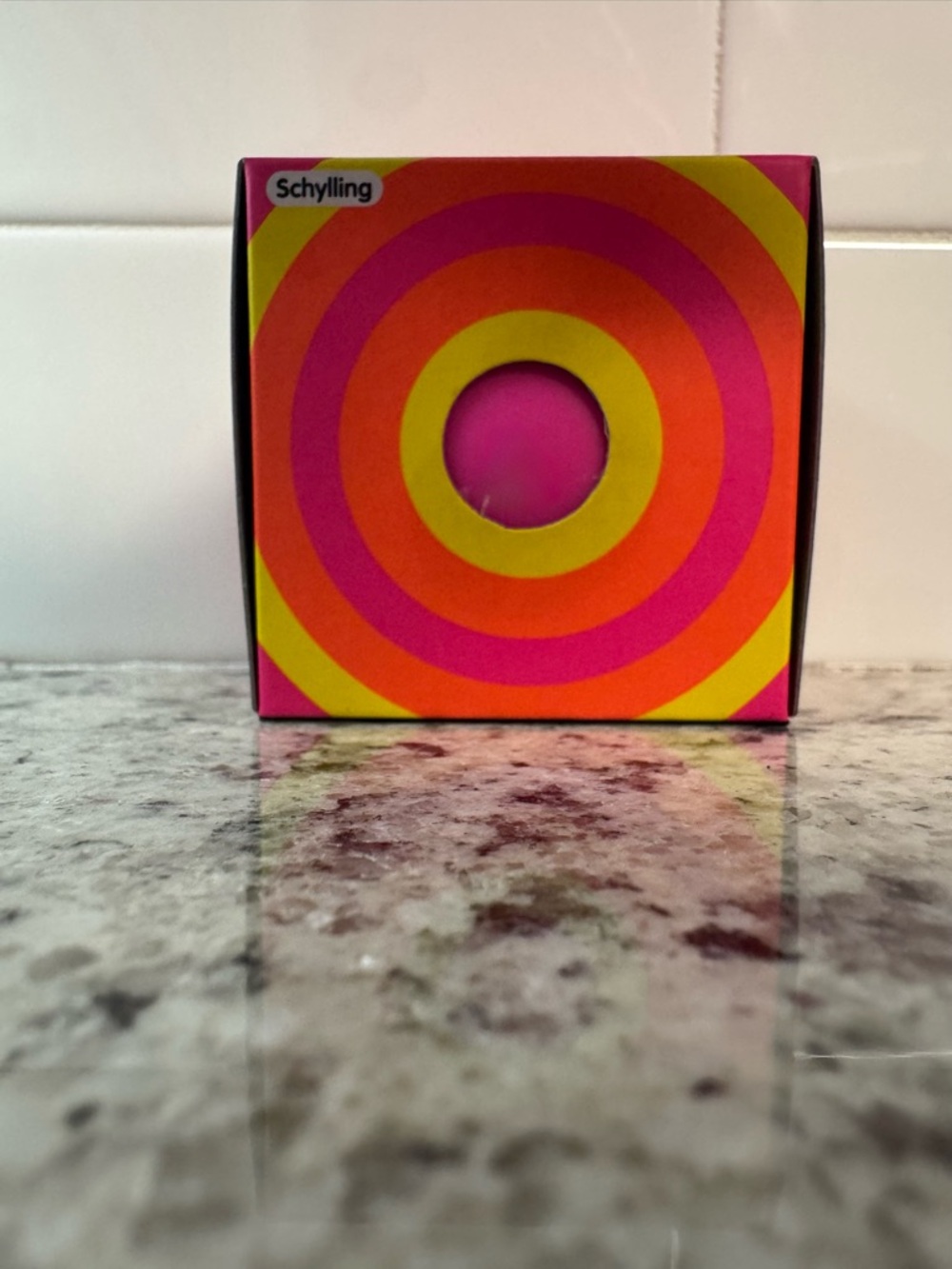 Pink color changing NeeDoh ball.